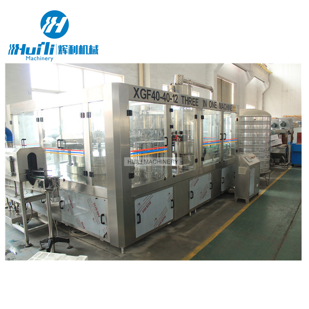 آلة تعبئة المياه المعدنية لزجاجة الزجاج مصنع تعبئة الزجاجات Huili
